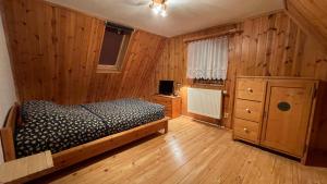 Postel nebo postele na pokoji v ubytování Chalupa Lučany