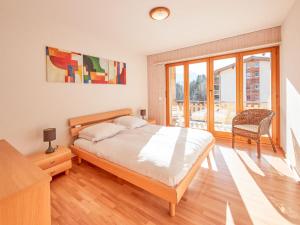 Ένα ή περισσότερα κρεβάτια σε δωμάτιο στο Apartment Sérandes-4 by Interhome