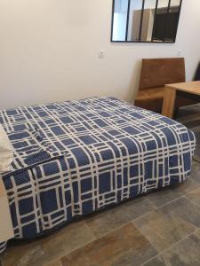 Ein Bett oder Betten in einem Zimmer der Unterkunft Beau studio moderne proche de CDG/Paris/Parc d'Expo