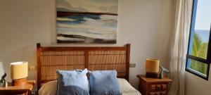 Ένα ή περισσότερα κρεβάτια σε δωμάτιο στο 'Dos Sirenas' Oceanfront Home