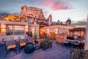 a resort with a mountain in the background at Dream of Cappadocia in Uçhisar