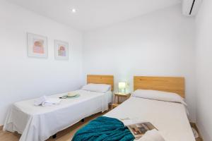 Posteľ alebo postele v izbe v ubytovaní Apartment Turmalina Front - Plusholidays