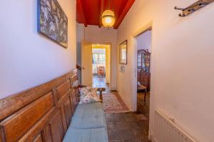 a hallway with a bench in a house at Ruime woning in het centrum van Domburg in Domburg