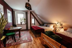 Postel nebo postele na pokoji v ubytování Kwieci Dom Gościnny sloowfood w Górach Izerskich