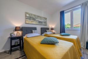 Postel nebo postele na pokoji v ubytování Villa InSa + 38 fotografií