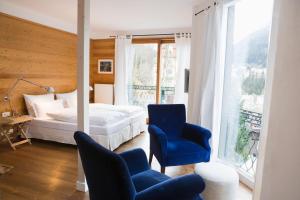 Postel nebo postele na pokoji v ubytování Alpine Spa Hotel Haus Hirt