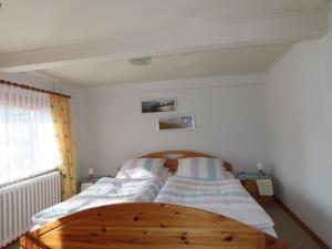 Katil atau katil-katil dalam bilik di Ferienhaus Zur Alten Post 1