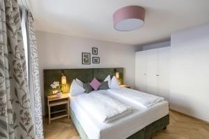 Voodi või voodid majutusasutuse Familienhotel Felsenhof toas