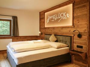 Ένα ή περισσότερα κρεβάτια σε δωμάτιο στο Holiday Home bergGlück by Interhome