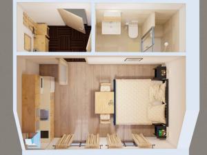 eine kleine Wohnung mit Stühlen in der Unterkunft Apartment Arnoltice 5 by Interhome in Arnoltice u Decina