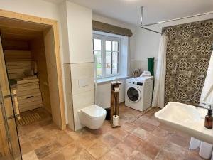 Ένα μπάνιο στο Ferienwohnung „Waschköök“ - Hof Mühlenkoppel