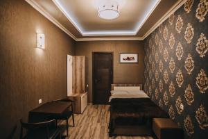 Postel nebo postele na pokoji v ubytování 7 Rooms Hotel