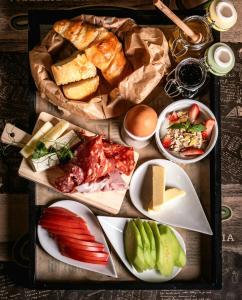 a table with a bunch of different types of food at HANCHO - KAPANA CENTER PLOVDIV in Plovdiv