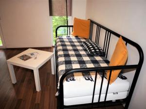 Ένα ή περισσότερα κρεβάτια σε δωμάτιο στο Holiday Home Pod Liščím Kopcem 2-2 sauna by Interhome