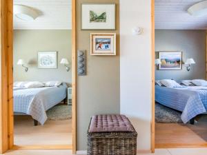 Cama o camas de una habitación en Holiday Home Nilikuru f15 by Interhome