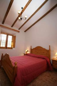 Postel nebo postele na pokoji v ubytování Casa rural El Salero Moratalla piscina y chimenea + 37 fotografií