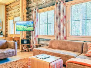 TV a/nebo společenská místnost v ubytování Holiday Home Nilikuru d10 by Interhome