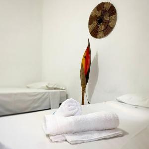 Cama ou camas em um quarto em Eco Pousada Mentawai