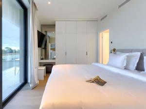 Postel nebo postele na pokoji v ubytování Holiday Home Semi-detached Villa Crveni vrh 1-2-3- by Interhome