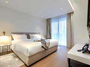 Postel nebo postele na pokoji v ubytování Holiday Home Semi-detached Villa Crveni vrh 1-2-3- by Interhome