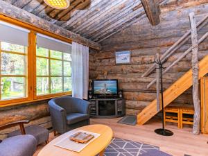 TV a/nebo společenská místnost v ubytování Holiday Home Vasamooli 3 by Interhome