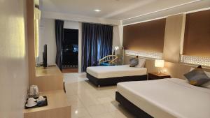 Katil atau katil-katil dalam bilik di iRest Ao Nang
