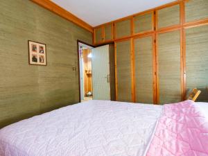 a bedroom with a large bed in a room at Apartment Le MOTTE by Interhome in Abetone