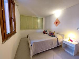 Katil atau katil-katil dalam bilik di Apartment Friscu by Interhome +19 gambar