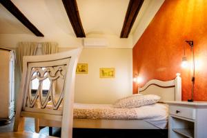 a bedroom with two beds in a room at Affittacamere famiglia Do in Racconigi