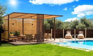 a pavilion with a table and chairs next to a pool at Cretan Sunrise Villa Heated Pool in Dhimitroulianá