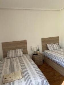 Postel nebo postele na pokoji v ubytování DJM Palms - Shared Casa Rural - Casa Rural Compartida - No es una casa privada