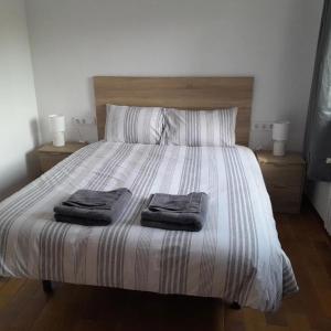 Postel nebo postele na pokoji v ubytování DJM Palms - Shared Casa Rural - Casa Rural Compartida - No es una casa privada