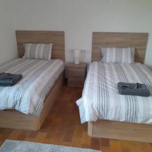 Postel nebo postele na pokoji v ubytování DJM Palms - Shared Casa Rural - Casa Rural Compartida - No es una casa privada