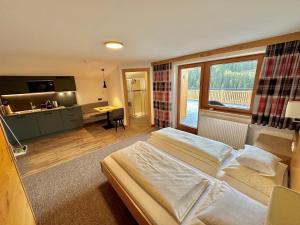 Jagdhof PURE Mountain Appartementsにあるベッド