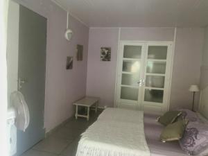 Voodi või voodid majutusasutuse Gîte 1001 Nuits - SHERAZADE toas