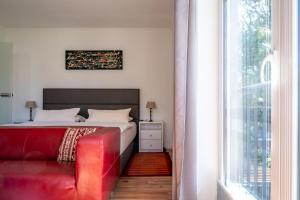 Postel nebo postele na pokoji v ubytování Hotel Gregory Wyk auf Föhr
