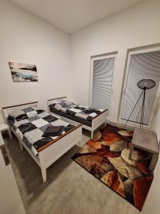Letto o letti in una camera di Apartmány Přerov 22