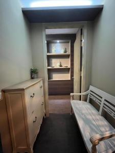 a room with a dresser and a room with a shelf at Guest Studio/Suite Condominum Near Batu Caves in Batu Caves