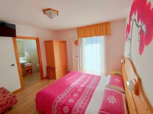 Postel nebo postele na pokoji v ubytování Albergo San Rocco