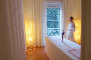 Postel nebo postele na pokoji v ubytování Alpine Spa Hotel Haus Hirt