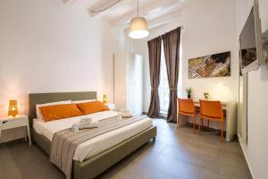 Posteľ alebo postele v izbe v ubytovaní B&B Cala Peppa