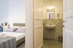 Posteľ alebo postele v izbe v ubytovaní B&B Cala Peppa