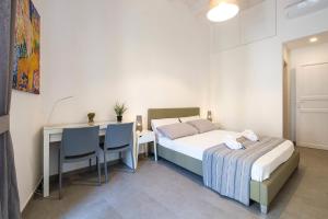 Posteľ alebo postele v izbe v ubytovaní B&B Cala Peppa