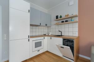 Кухня або міні-кухня у Trendy Apartment Polna in Poznan by Renters