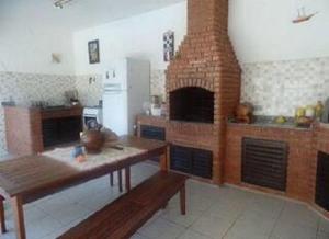 Billede fra billedgalleriet på Piscina 6 QUARTO 300m PRAIA jardim churrasqueira 16 PESSOAS garagem 3 carros Monitoramento 24 horas Mesa de sinuca i Itanhaém