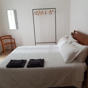 Ένα ή περισσότερα κρεβάτια σε δωμάτιο στο La Terrazza Apartment,a 50 mt dal mare +7 φωτογραφίες