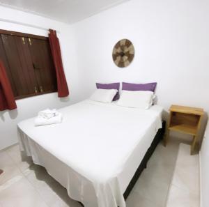Cama ou camas em um quarto em Eco Pousada Mentawai