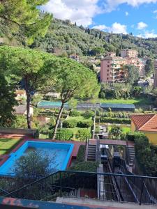 a view of a swimming pool in a city at Casa Betti in Rapallo