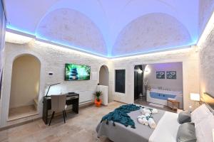 Voodi või voodid majutusasutuse Suite Laurel SPA con idromassaggio toas