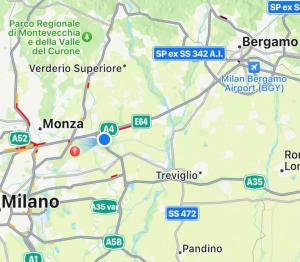 un mapa de una ciudad con un punto rojo en Era apartments posizione Milano-Bergamo-Monza en Caponago